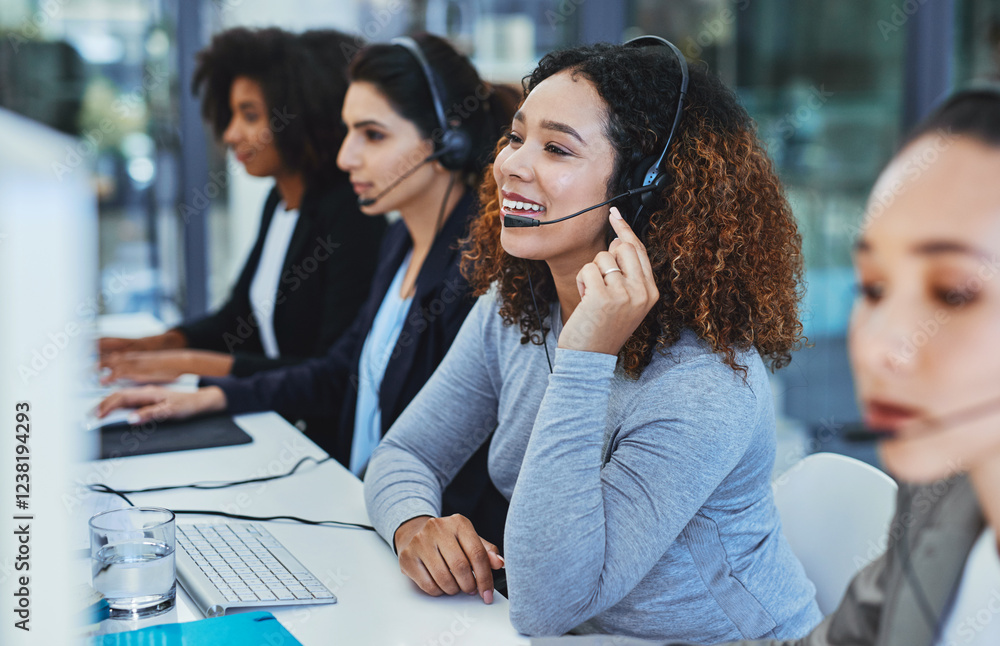 People chatting and looking at a computer